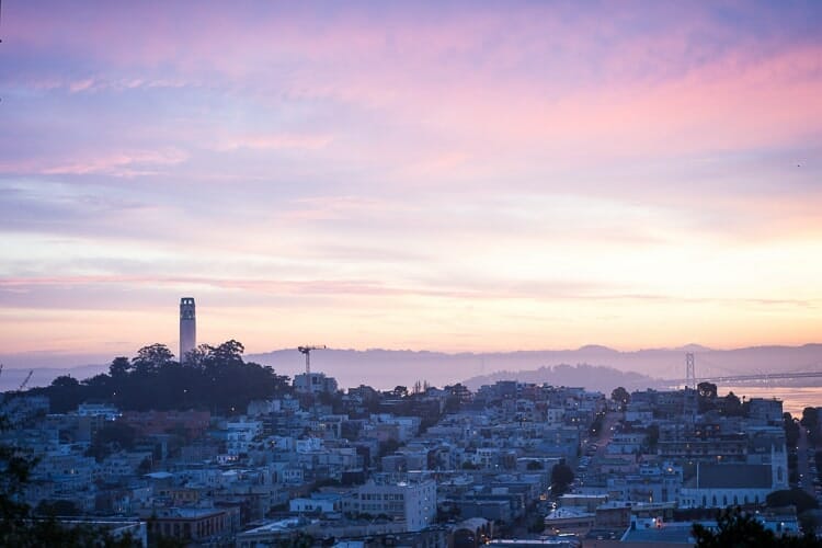 view of coit tower sunset sf